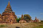 The cluster of red brick temples, named Khay-min-gha on the map on the North plain of Bagan. Myanmar. 